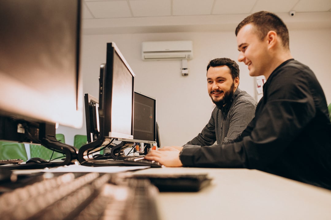 young-male-web-designers-working-on-a-computer